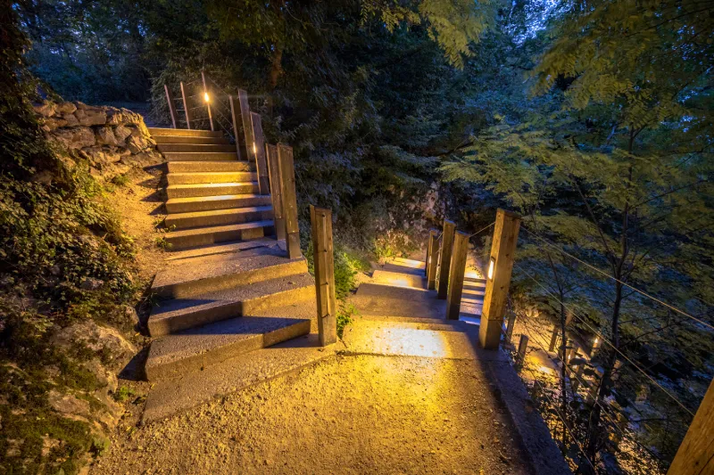 Illuminated outdoor stairway in park