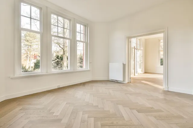 Homeowner performing essential maintenance tasks on their property