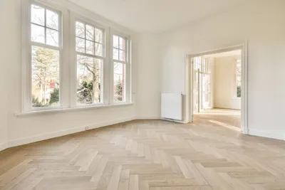 Homeowner performing essential maintenance tasks on their property